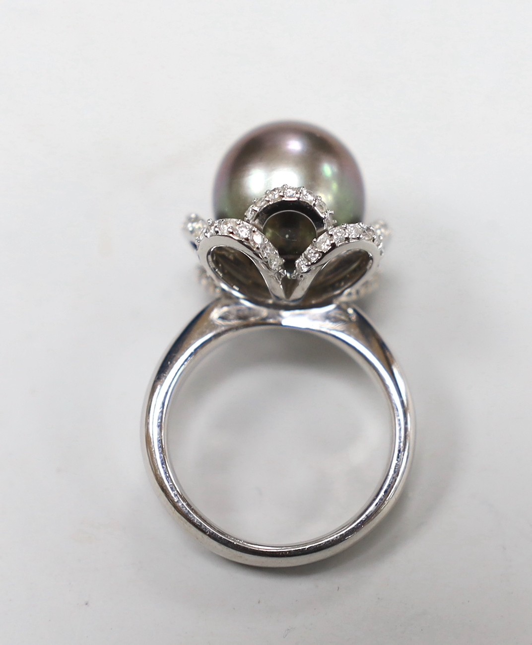 A modern Italian 750 white metal, cultured pearl and diamond chip set dress ring, with accompanying GCS report dated 10/11/2022, size M/N, gross weight 11.2 grams.